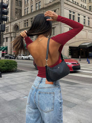 Wine ribbed long sleeve top with open back detail.