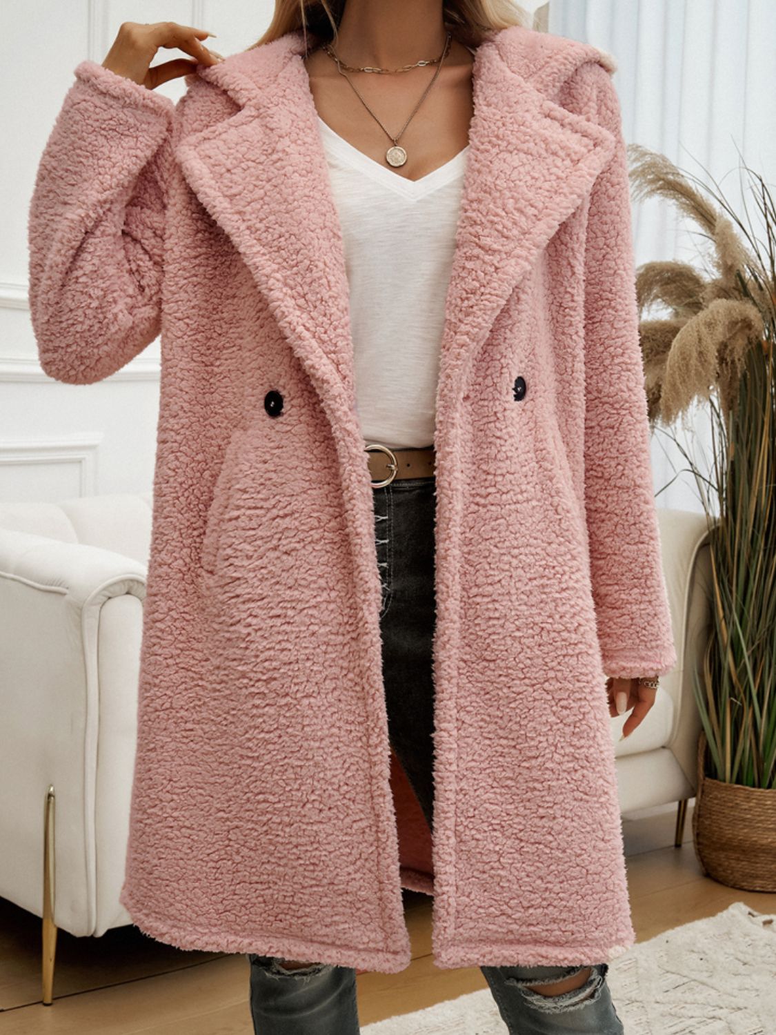 Dusty Pink teddy hooded cocoon coat with double breasted closure and lapel collar.