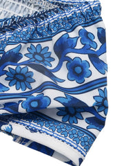 Blue floral print halter neck mini dress with smocked top detail