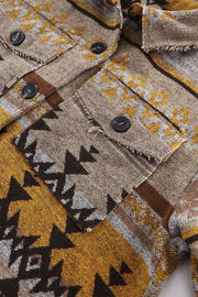 GeoChic collar jacket in camel with geometric pattern and chest pockets.