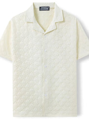 Ivory embossed floral camp collar shirt with short sleeves and button front.