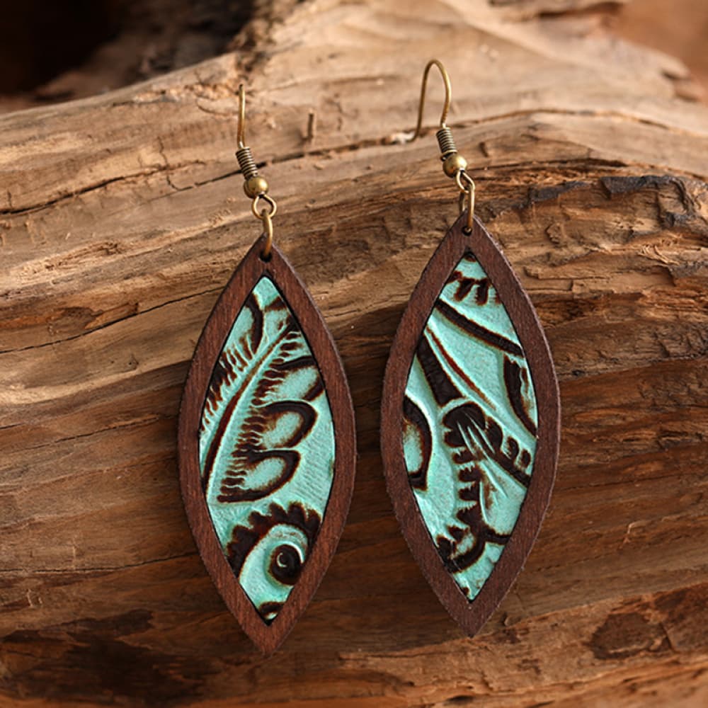 Tooled leather and wood drop earrings with turquoise inlay and leaf pattern