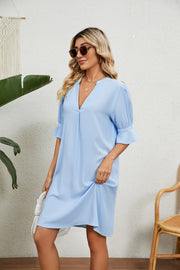 Sky blue V-neck shift dress with flutter sleeves and a relaxed fit.