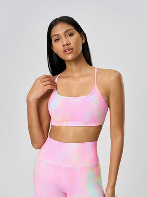 Strappy back active crop top in multicolor tie-dye with a scoop neckline.
