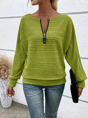 Sage ribbed quarter zip sweatshirt with O-ring pull and dolman sleeves.