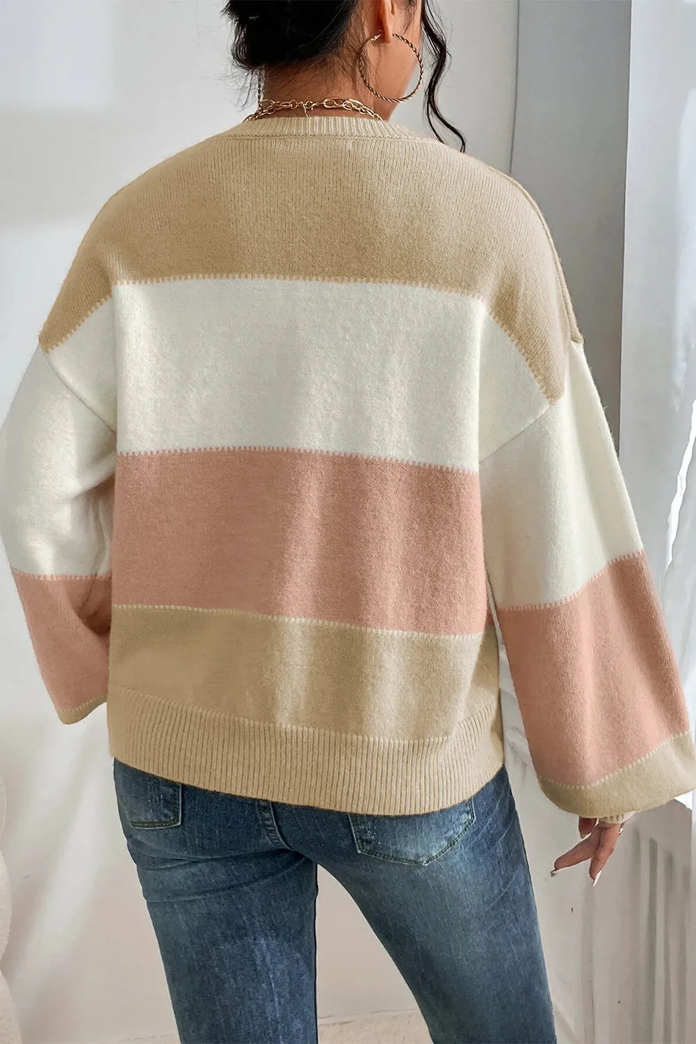 Chic contrast stripe knit sweater with lantern sleeves in khaki and pink.