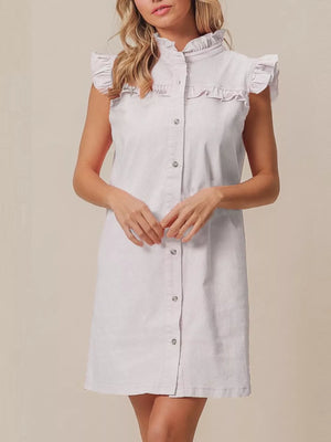White denim dress with ruffled collar, cap sleeves, and button front.