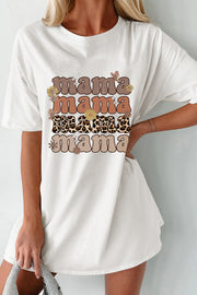 White cotton oversized tee dress with stacked "mama" graphic and floral accents.
