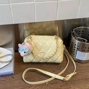 Quilted Chain Strap Crossbody Bag in Yellow, side view