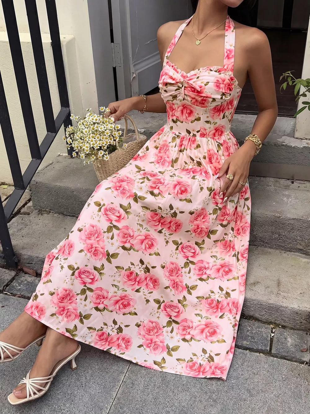 Romantic floral halter midi dress with pink roses and a-line cut.
