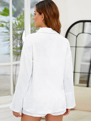 White textured cotton relaxed fit buttoned shirt with long sleeves, part of a co-ord set.