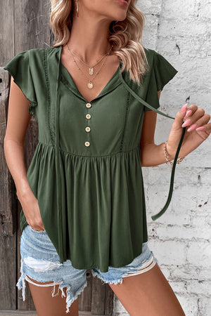 Sage tie-neck blouse with ruffle sleeves and button front, empire waist.