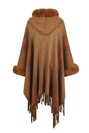 Brown hooded poncho with faux fur trim, striped pattern, and fringe hem.