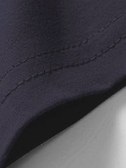 Blue cotton t-shirt detail showing stitching and fabric texture.