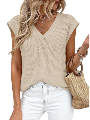 Textured apricot knit V-neck sweater vest with cap sleeves.