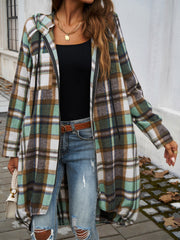 Draped plaid cocoon hoodie jacket in green, brown, and white with a zip front and hood.