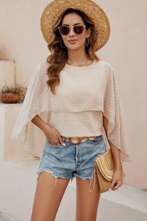 Dotted Swiss cape sleeve blouse in light beige with a layered design.