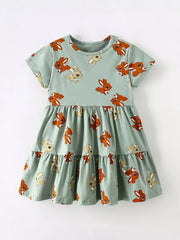 Baby tiered dress in mint green cotton blend with playful bunny print and short sleeves.