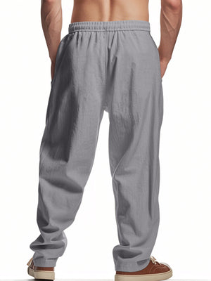 Men's grey sweatpants with drawstring waist and pockets, relaxed fit.