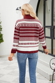 Geometric jacquard turtleneck sweater in deep red and white with long sleeves.