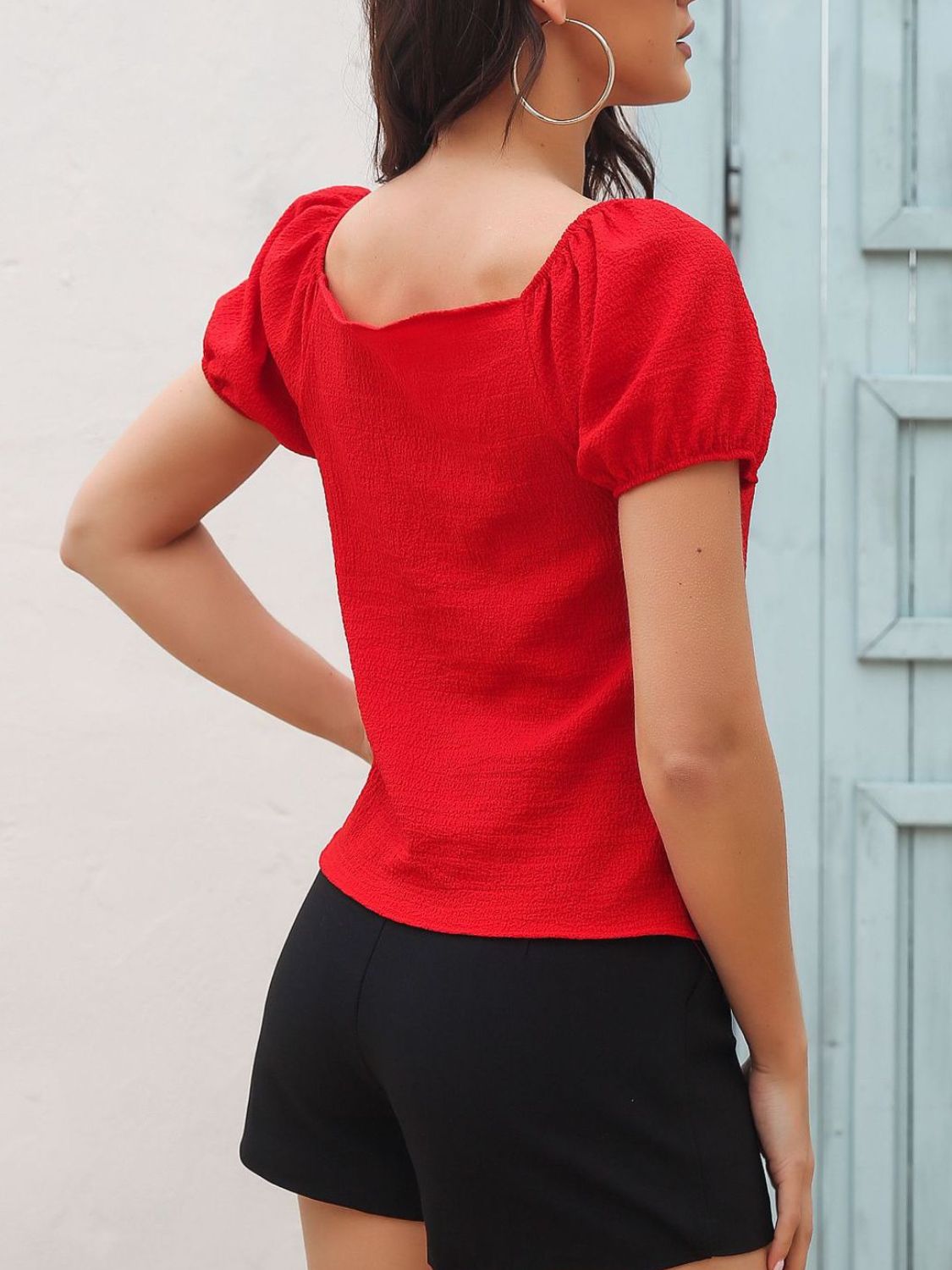 Red ruched puff sleeve blouse with square neckline