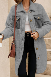Gray sherpa coat with corduroy patch pockets and button front.