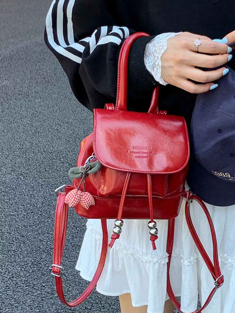 Pu Leather Mini Backpack Bag in Red, model styling view