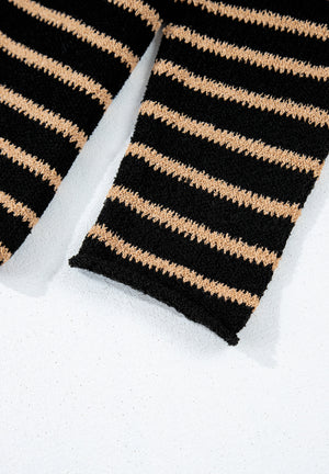 Black and tan striped slouchy knit jumper with a textured stitch.