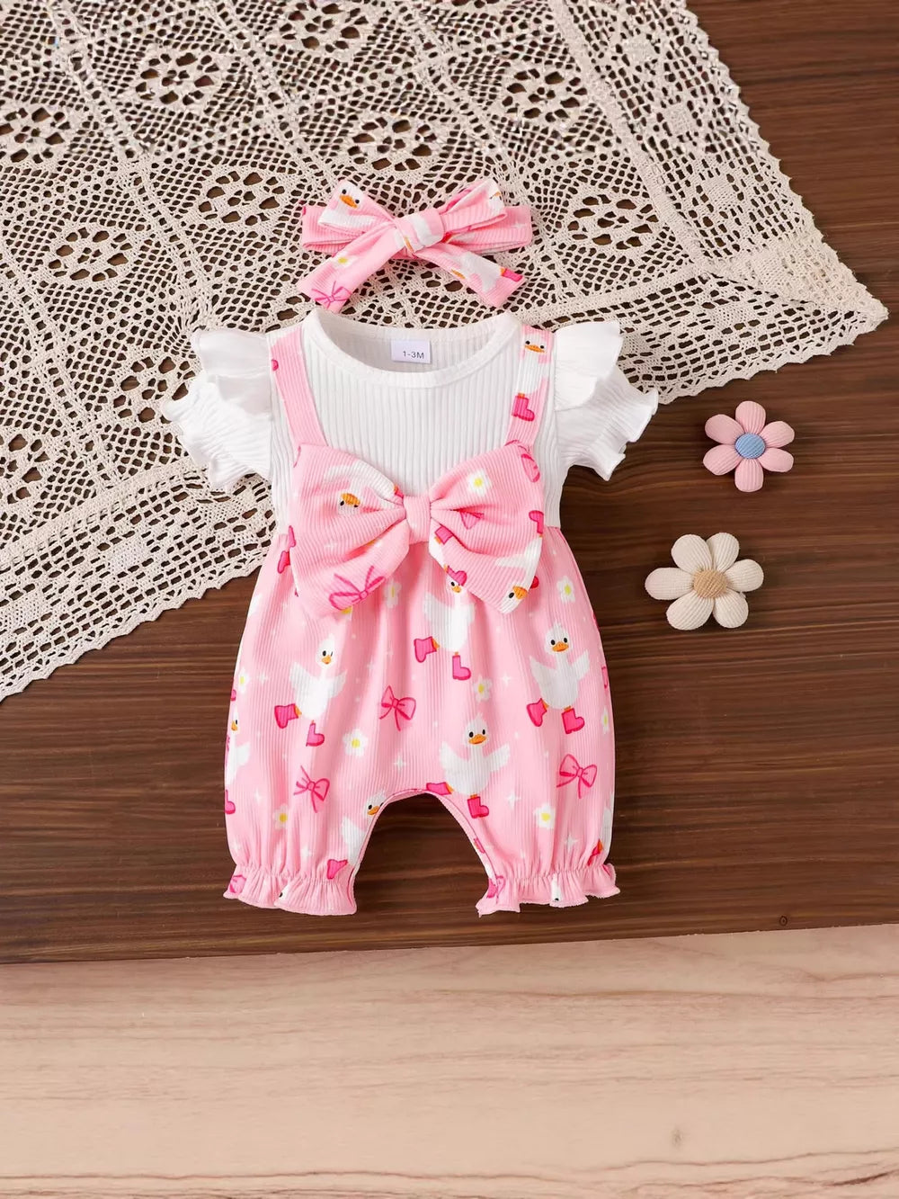 Children's Bow Duck Print Romper With Headband in Pink, close-up detail