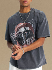 Graphic print washed cotton tee in dark gray with a bold lip graphic and distressed details.