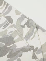 Men's camouflage wide-leg cargo pants in white and grey with visible stitching detail.