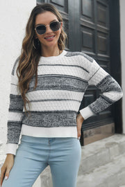 Ombre stripe knit sweater with diamond texture and crew neck.