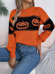 Orange acrylic knit sweater with black jack-o'-lantern intarsia pattern and crew neck.