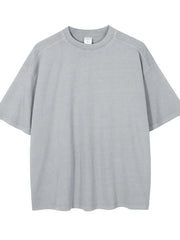 Oversized washed cotton t-shirt in gray with a crew neck and short sleeves.