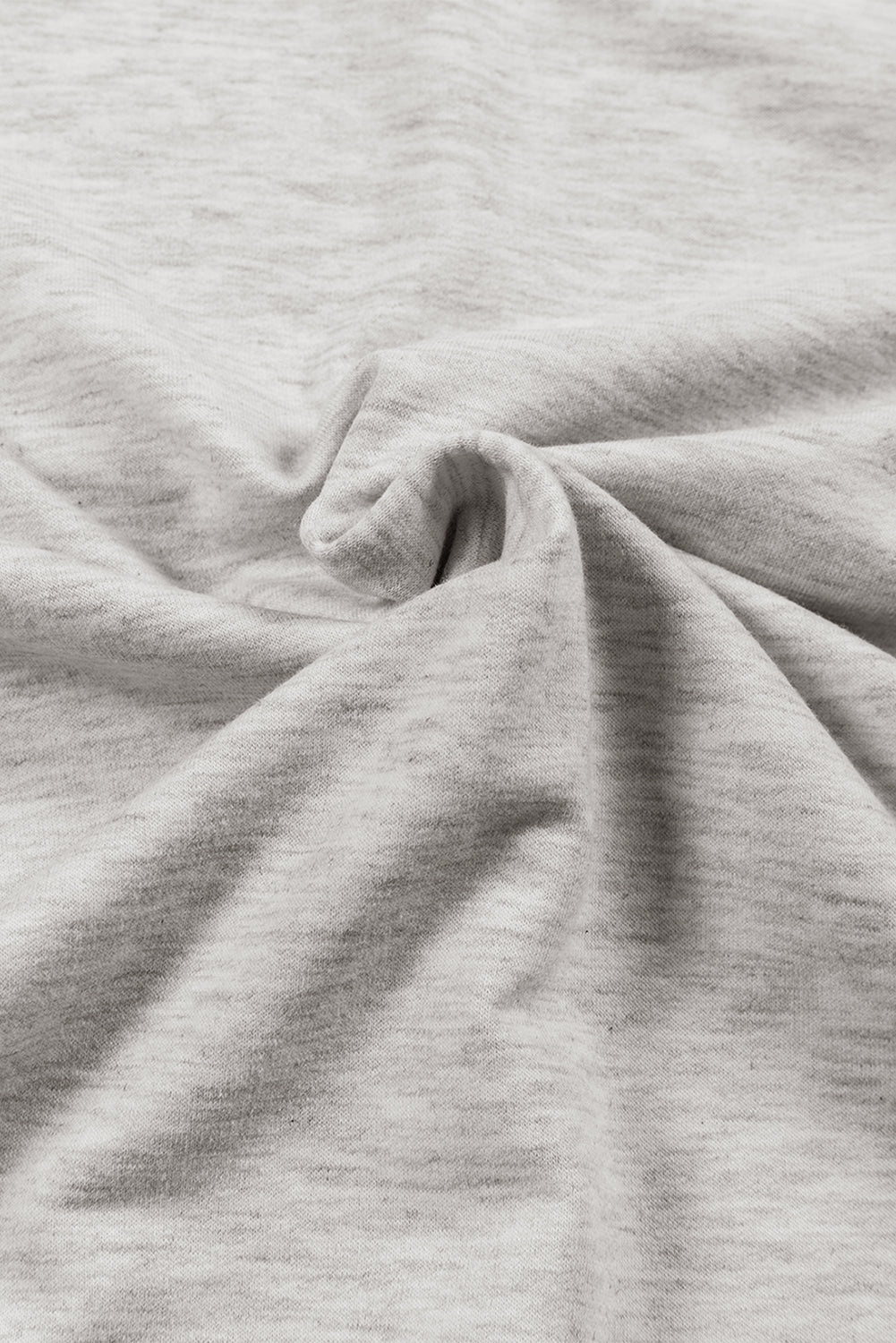 Light gray marled tunic with cowl neckline and drape front detail.