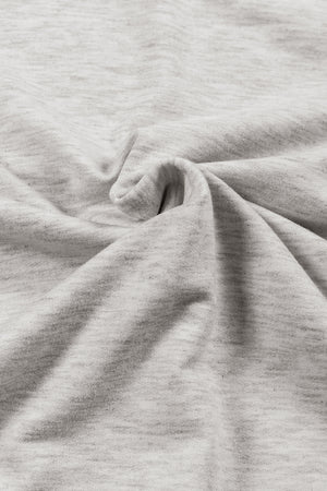 Light gray marled tunic with cowl neckline and drape front detail.