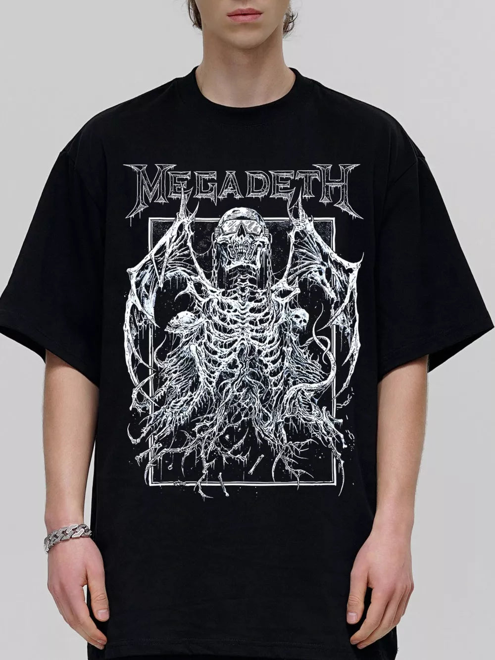 Black cotton blend crew neck tee with edgy vintage skeleton graphic and band logo.