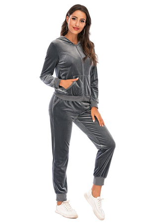 Velvet loungewear set in charcoal with zip-up hoodie and jogger pants.