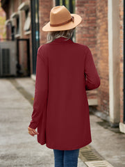 Draped cascade cardigan in wine with long sleeves and a relaxed fit.