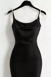Black satin cowl neck maxi dress with pearl-embellished straps