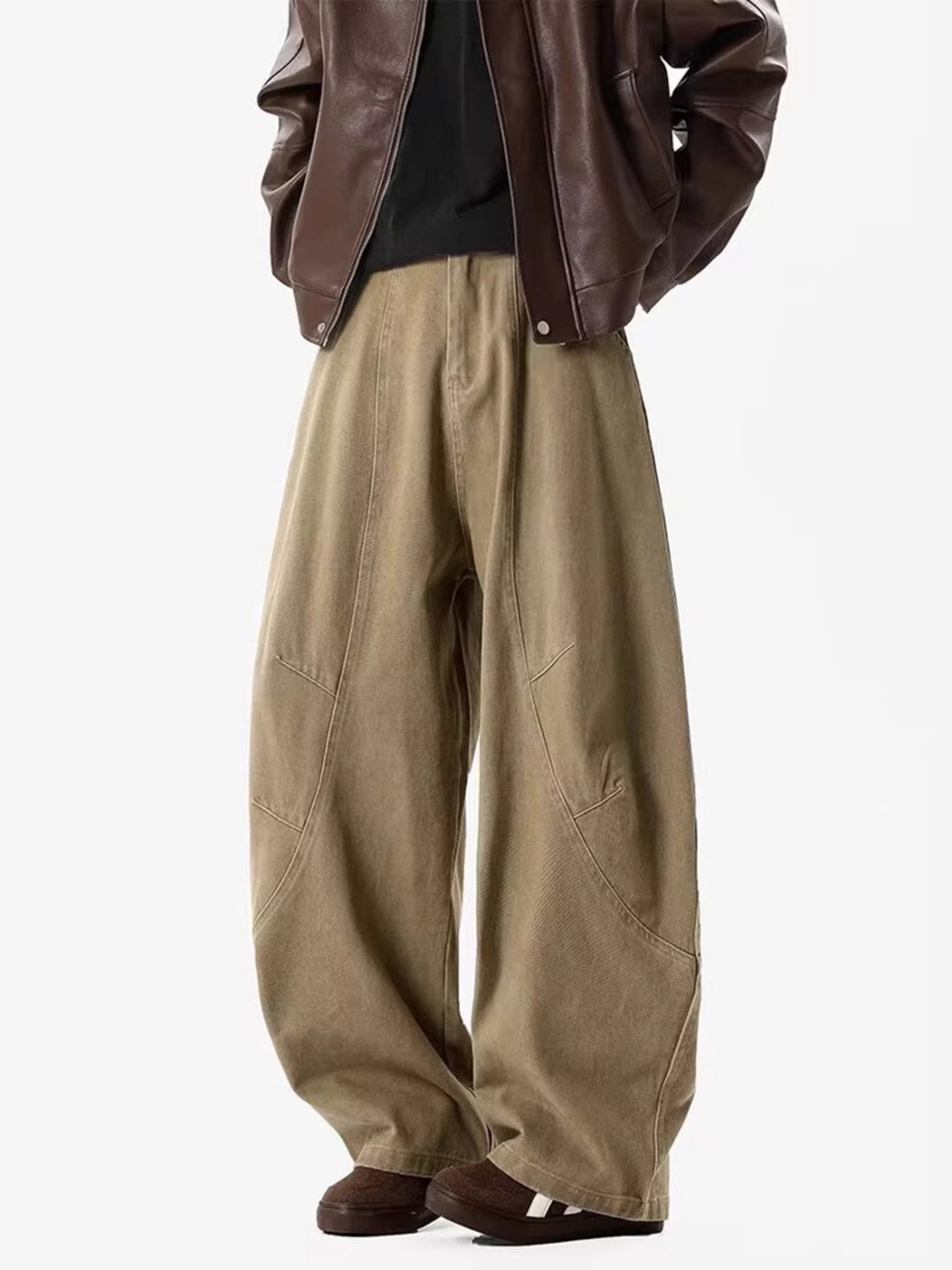 Men's taupe wide-leg sweatpants with panel detailing and a relaxed fit.