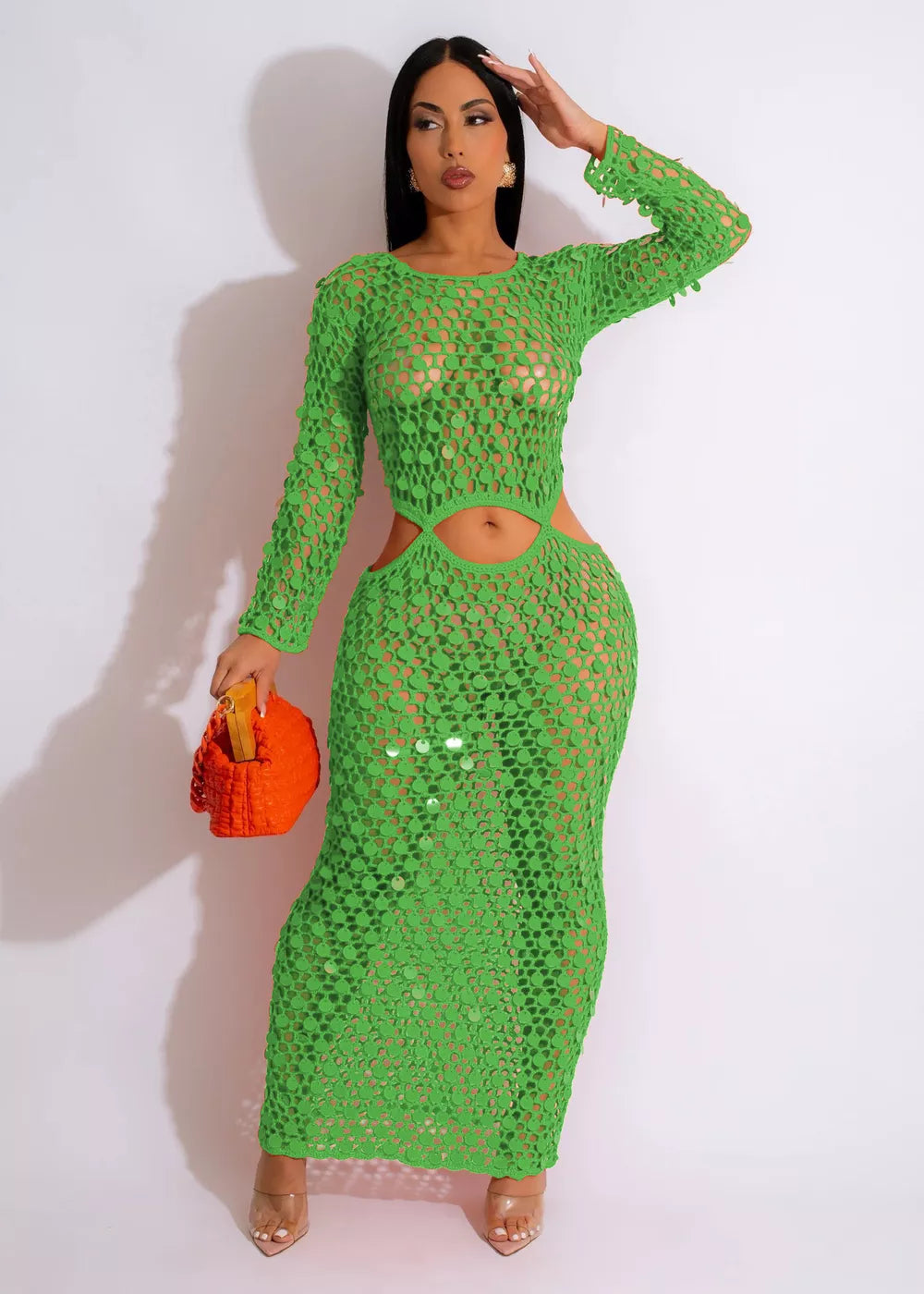 Green mesh cutout maxi dress with long sleeves and sequin details.