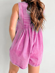 Pleated denim tie-front playsuit in hot pink, sleeveless A-line shorts.