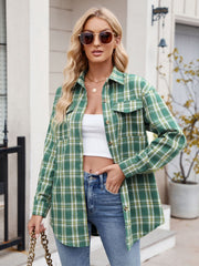 Green plaid overshirt with patch pockets and button front, styled with a white crop top and jeans.