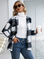 Belted black plaid overshirt with patch pockets, button-down front, and collared neckline.