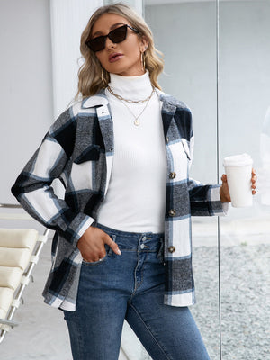 Belted black plaid overshirt with patch pockets, button-down front, and collared neckline.
