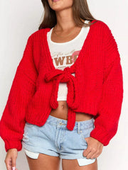 Scarlet tie-front knit cardigan with textured chunky knit and balloon sleeves.