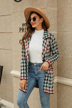 Grid-print knit blazer coat in white, green, and red houndstooth pattern.