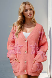 Coral textured starburst pocket cardigan with button front and V-neck.