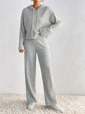 Light gray ribbed knit cropped hoodie and wide leg pants set with drawstring hood.